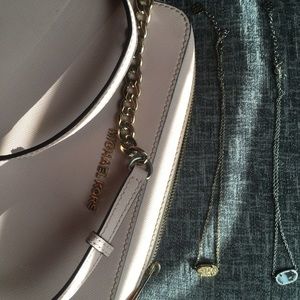 Michael Kors bag & 2 Kendra Scott necklaces.